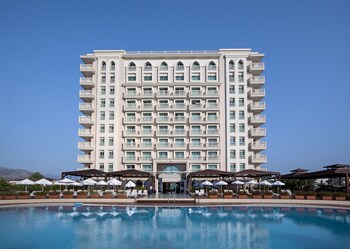 Indoor pool, outdoor pool, pool umbrellas, sun loungers