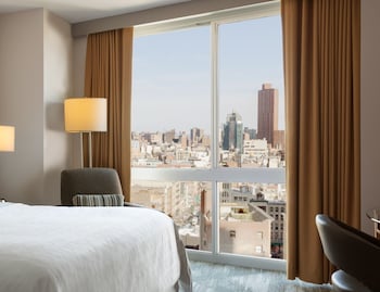 Down comforters, pillowtop beds, in-room safe, desk