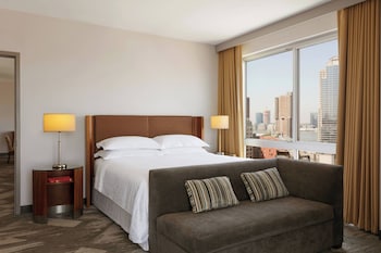 Down comforters, pillowtop beds, in-room safe, desk