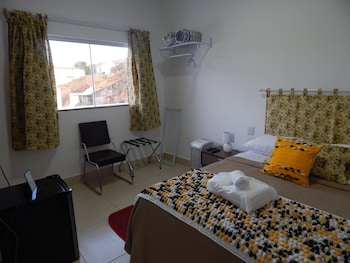 Frigobar, cortinas blackout, quartos à prova de som