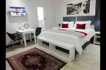 Blackout curtains, iron/ironing board, rollaway beds, free WiFi