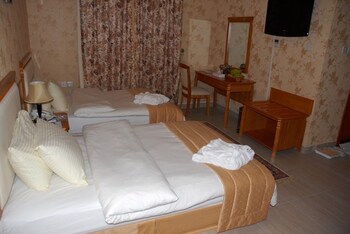 Pillow top beds, minibar, in-room safe, desk