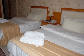 Pillow top beds, minibar, in-room safe, desk