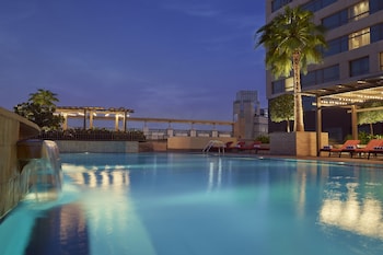 Outdoor pool, pool umbrellas, pool loungers