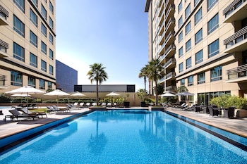 Outdoor pool, pool umbrellas, pool loungers