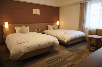 Premium bedding, down comforters, pillowtop beds, individually decorated