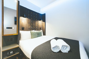 Een kluis op de kamer, verduisterende gordijnen, gratis wifi, beddengoed