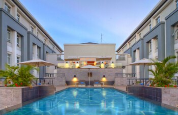 Outdoor pool, pool umbrellas, pool loungers
