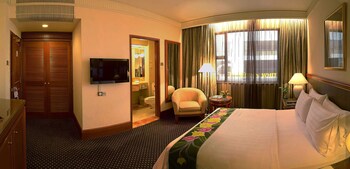Free minibar, in-room safe, desk, iron/ironing board