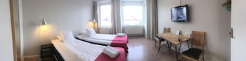 Skrivbord, strykjärn/strykbräda, extrasängar och gratis wi-fi
