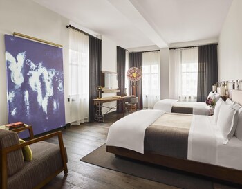 Frette Italian sheets, premium bedding, down duvet, minibar
