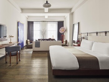 Frette Italian sheets, premium bedding, down duvet, minibar