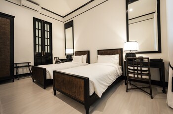 Pillow top beds, free minibar items, in-room safe, desk
