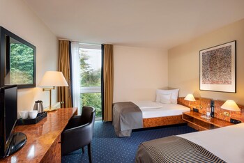 Allergikerbettwaren, Minibar, Zimmersafe, Verdunkelungsvorhänge