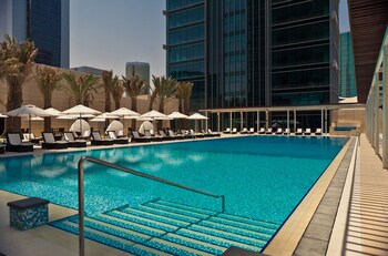 Outdoor pool, pool umbrellas, pool loungers