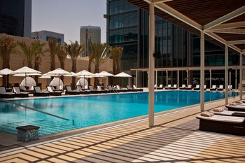 Outdoor pool, pool umbrellas, pool loungers