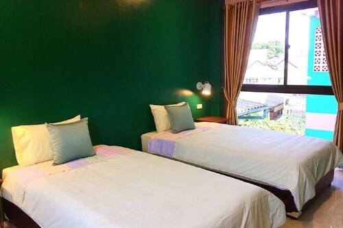 Desk, blackout curtains, free WiFi, bed sheets