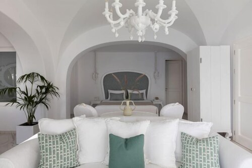 2 habitaciones, ropa de cama de alta calidad y minibar